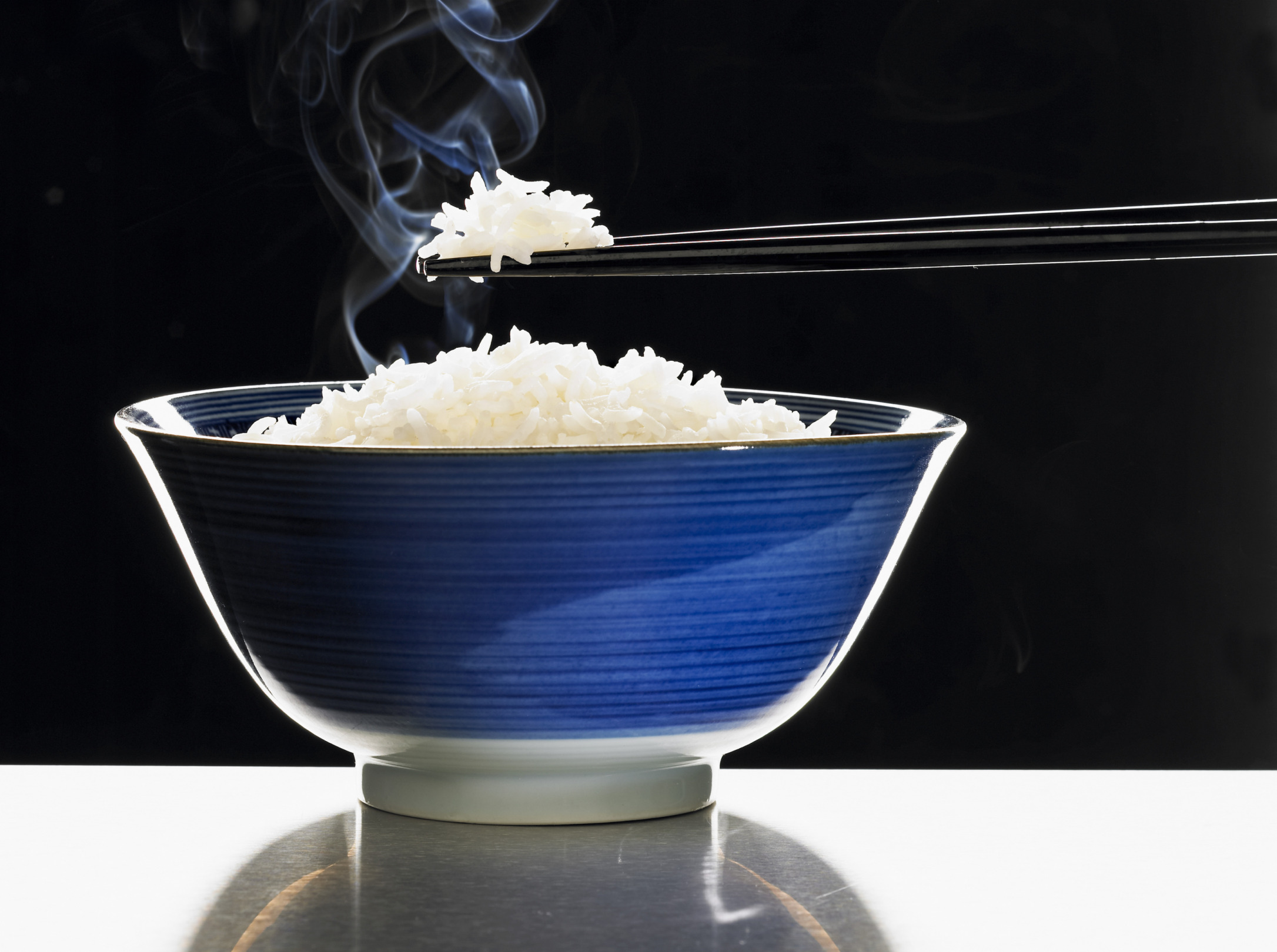 Steaming white rice in a steam фото 11